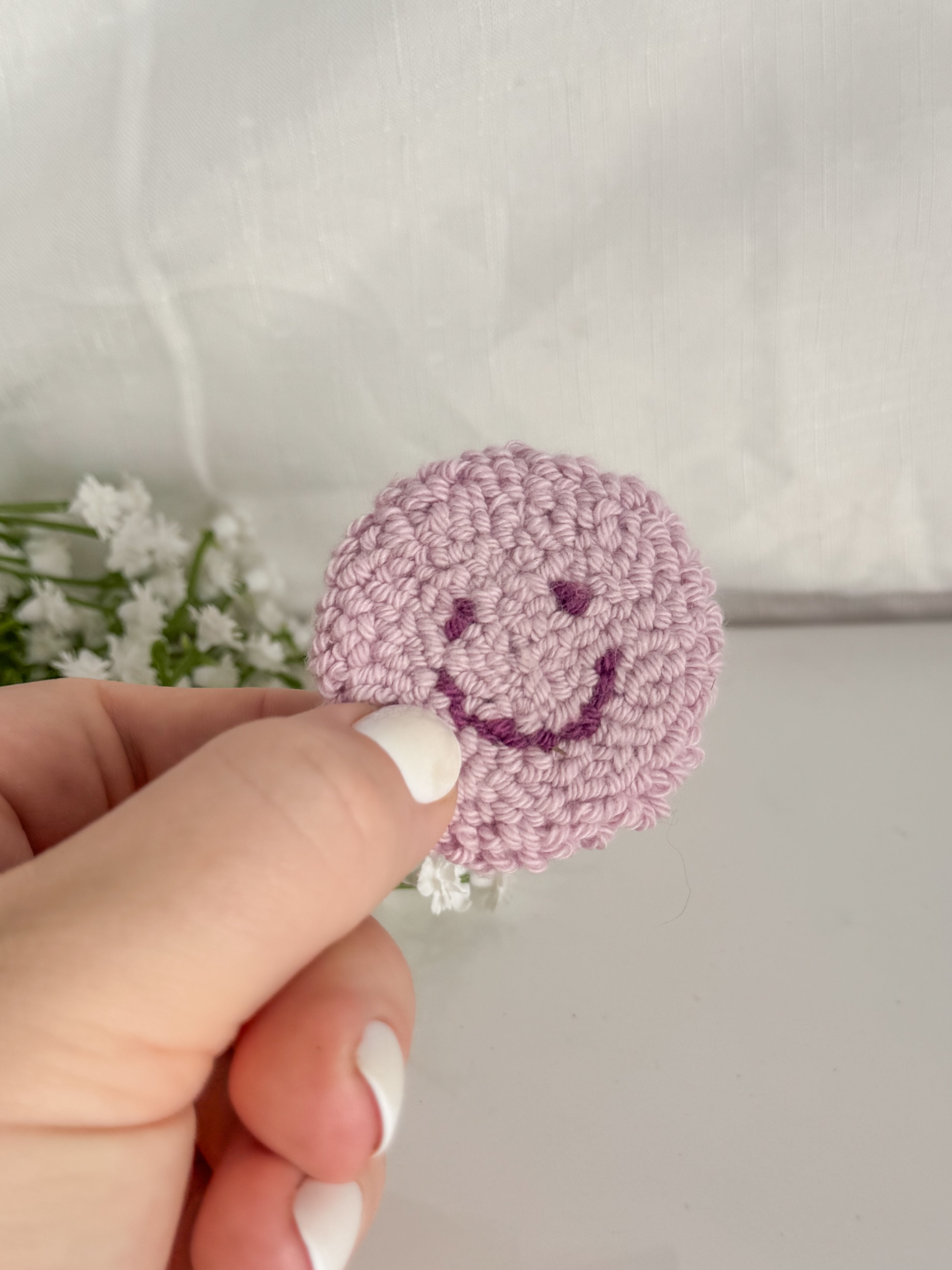 Smiley Face Punch Needle Phone Grip